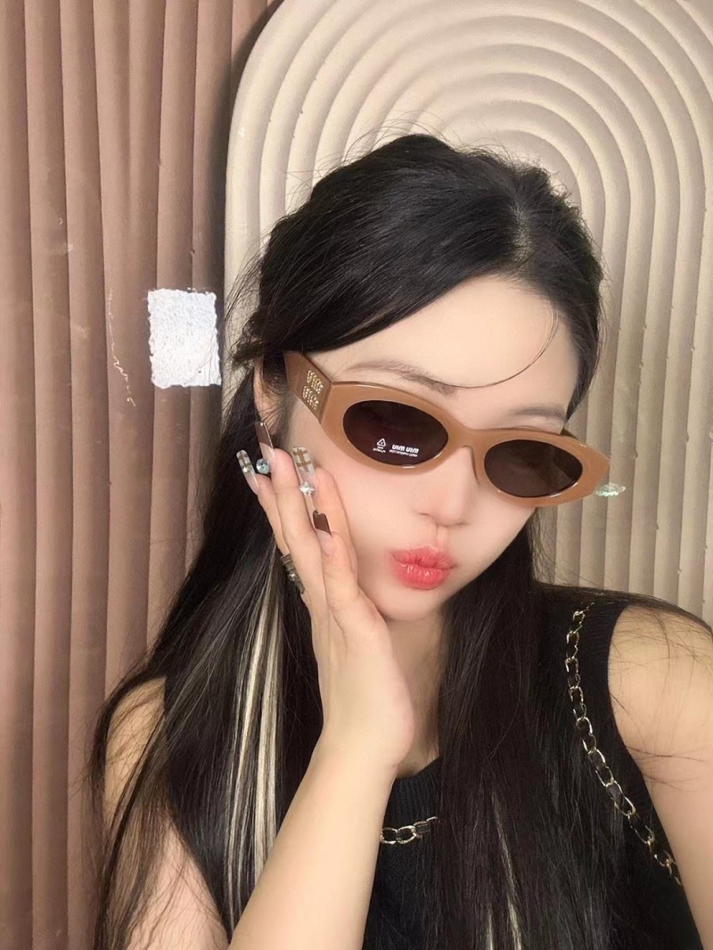 Miu miu Sunglasses